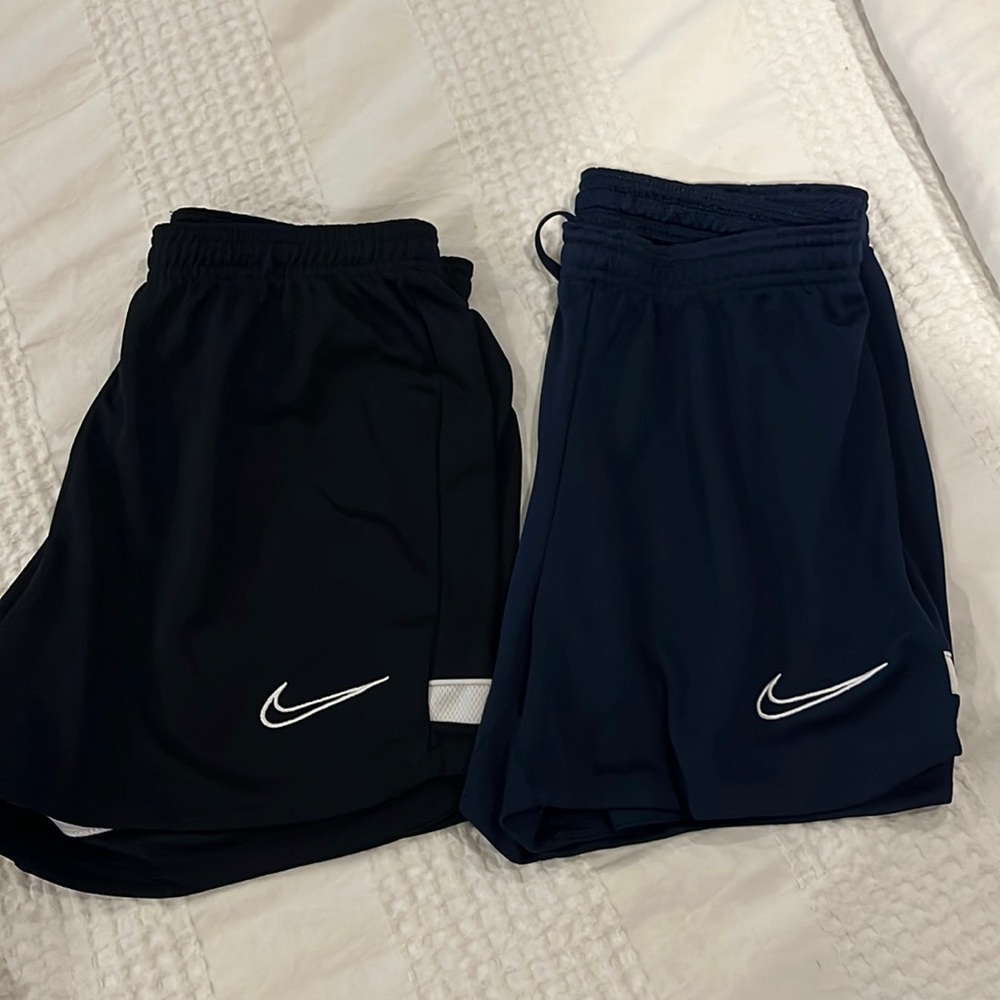 Nike soccer shorts x2.   Black and Navy